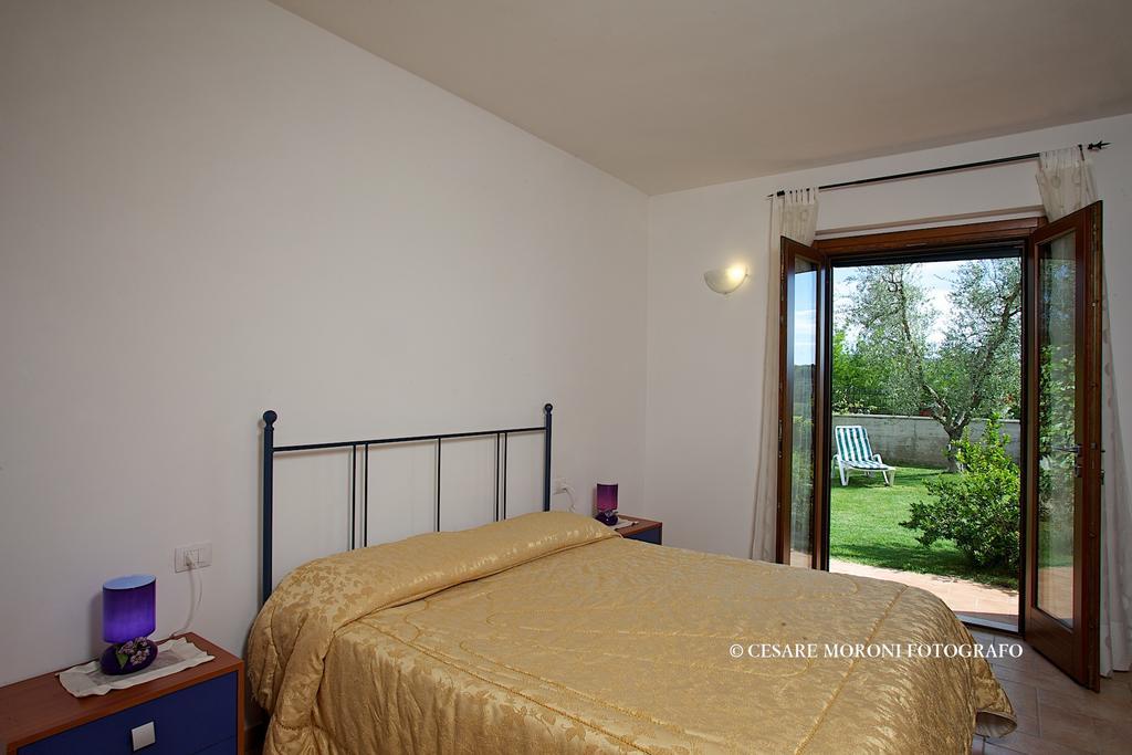 Residence Ai Campi Da Golf Сатурния Номер фото